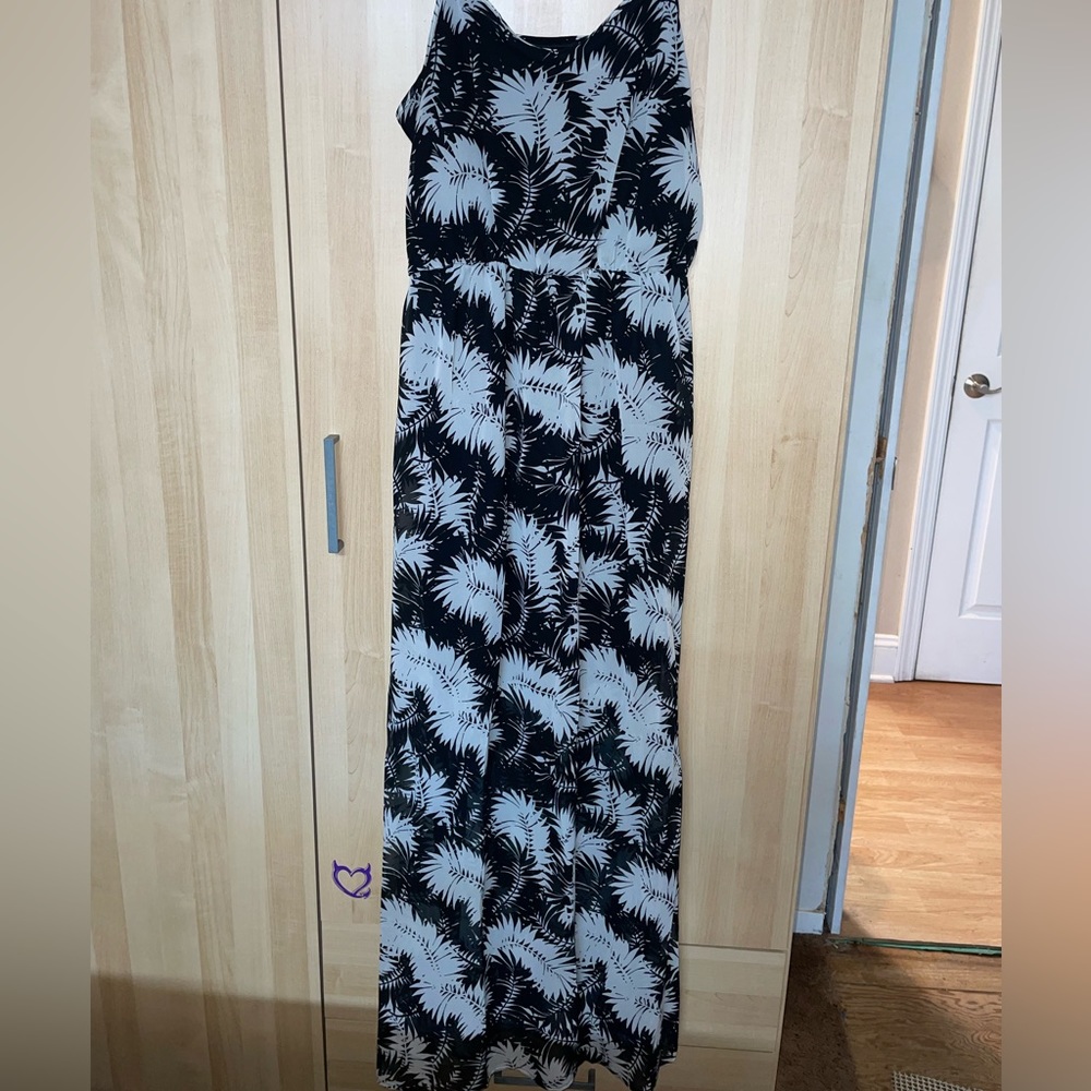 Charming Charlie long black & white sheer dress. White is palm leaf print.